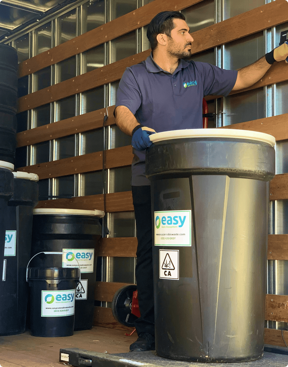 man working on cannabis waste hauling